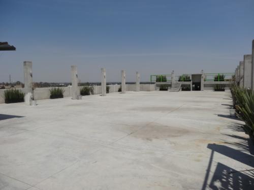 TERRENO CON EDIFICIO Y AMENIDADES