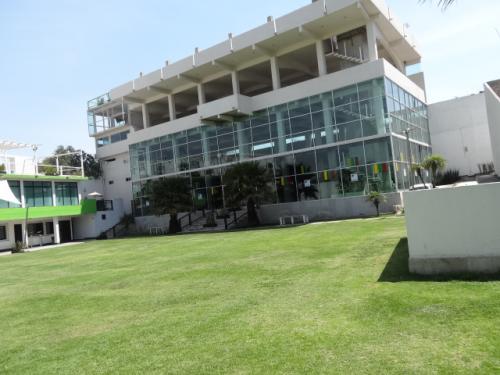 TERRENO CON EDIFICIO Y AMENIDADES